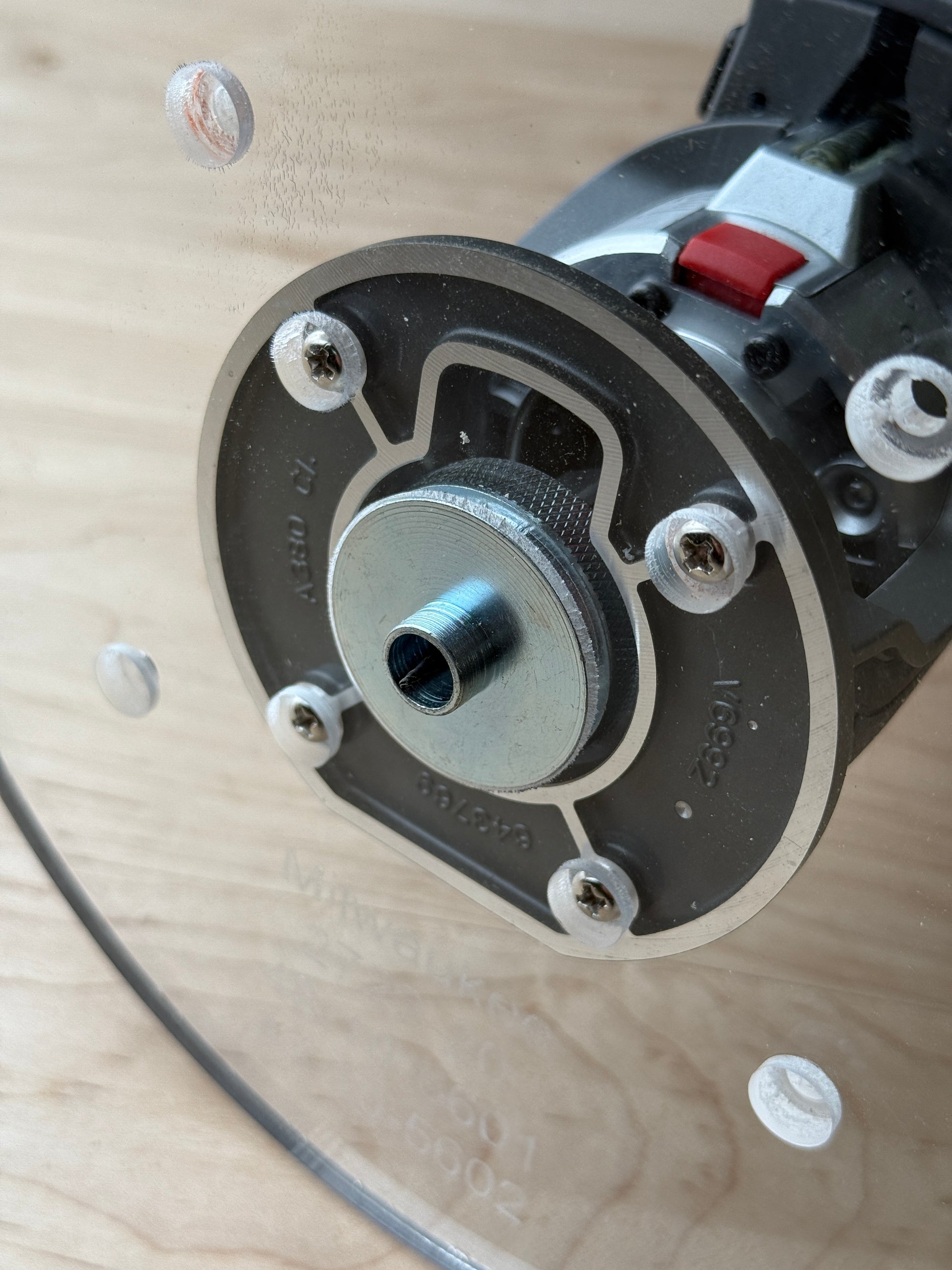 8 inch Round Router Base Plate - fits Bosch Colt GKF18V-25 Is your factory router base not large enough? We have you covered. This is our 8 inch round router base that fits the Bosch Compact Trim Router also fits the plunge base. It's made out of 3/8" cast acrylic to be very durable! It has countersunk holes so that you can use the factory screws. It is compatible with PC-style router bushing sets