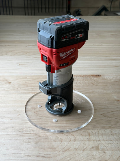 8 inch Round Router Base Plate - fits Milwaukee 2723-20 or 48-10-5601 Is your factory router base not large enough? We have you covered. This is our 8 inch round router base that fits the Milwaukee Compact Trim Router also fits the plunge base. It's made out of 3/8" cast acrylic to be very durable! It has countersunk holes so that you can use the factory screws. It is compatible with PC-style router bushing sets.

It will fit the Milwaukee 2723-20 or 48-10-5601