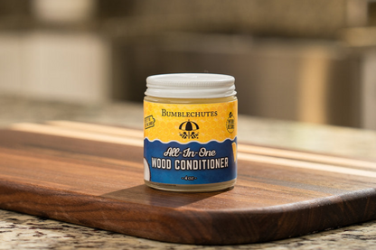 Bumblechutes All-In-One Wood Conditioner Wood finish - the All-In-One Wood Conditioner, the ultimate solution for maintaining the beauty and longevity of your wooden kitchenware. Crafted with only the finest natural ingredients, including premium-grade beeswax sourced exclusively from professional beekeepers in the USA and top-tier organic carnauba wax, this conditioner is a must-have for anyone who values quality and safety.