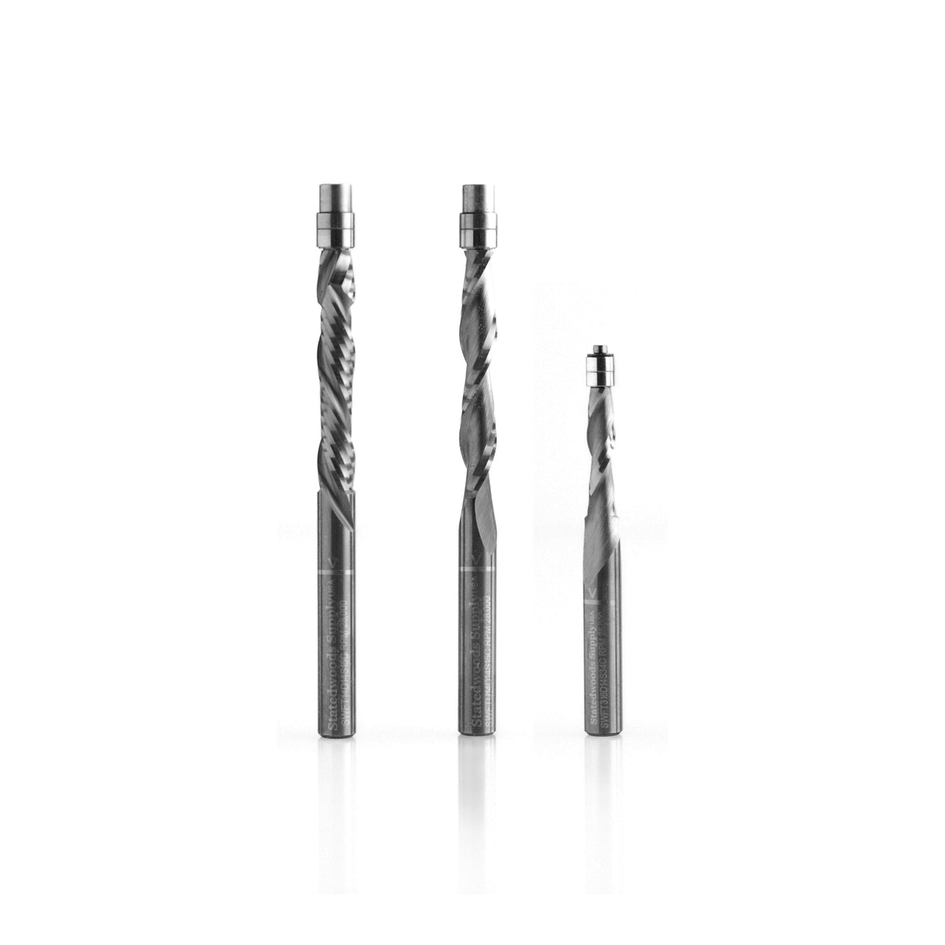 Three drill bits of different sizes on a white background