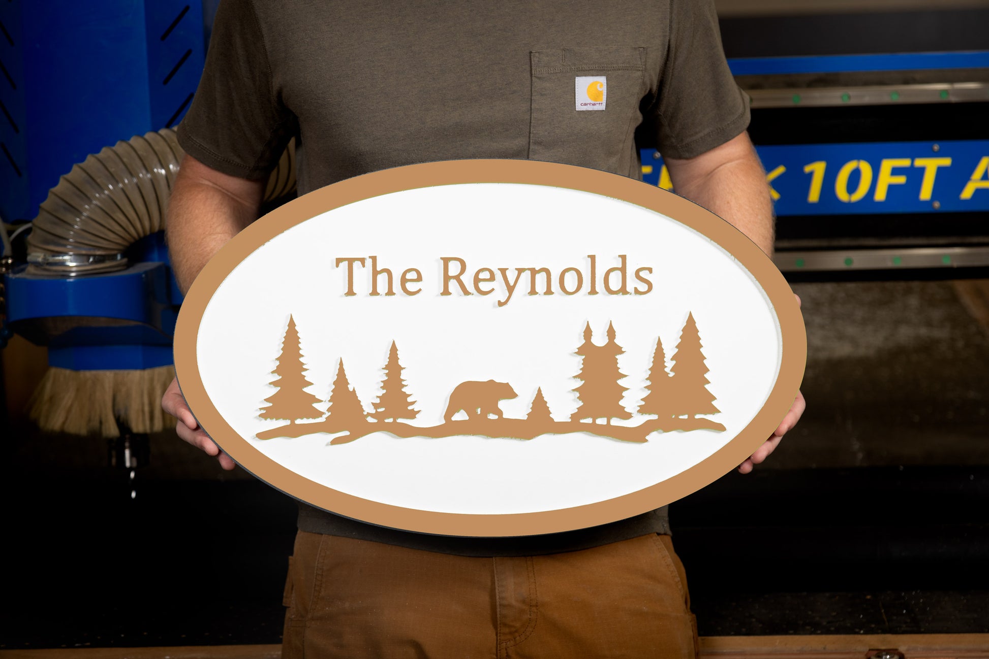 brown oval large house sign mountain trees bear custom