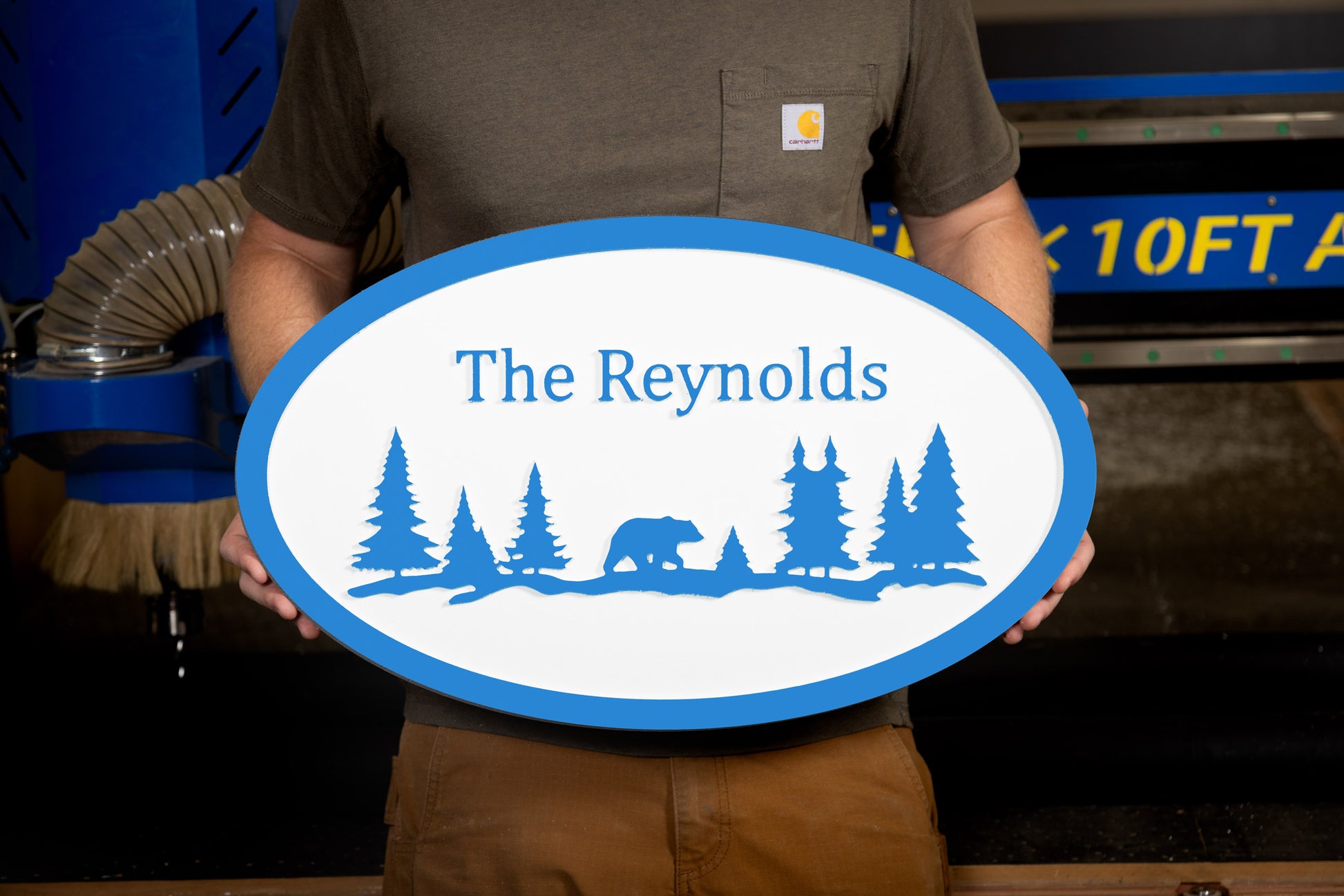 blue oval large house sign mountain trees bear custom