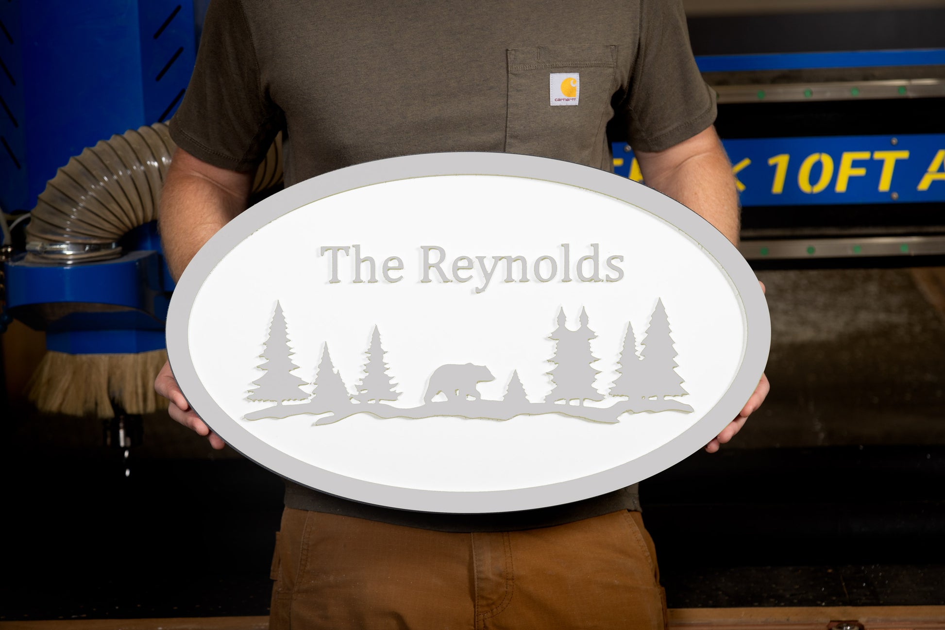 grey oval large house sign mountain trees bear custom