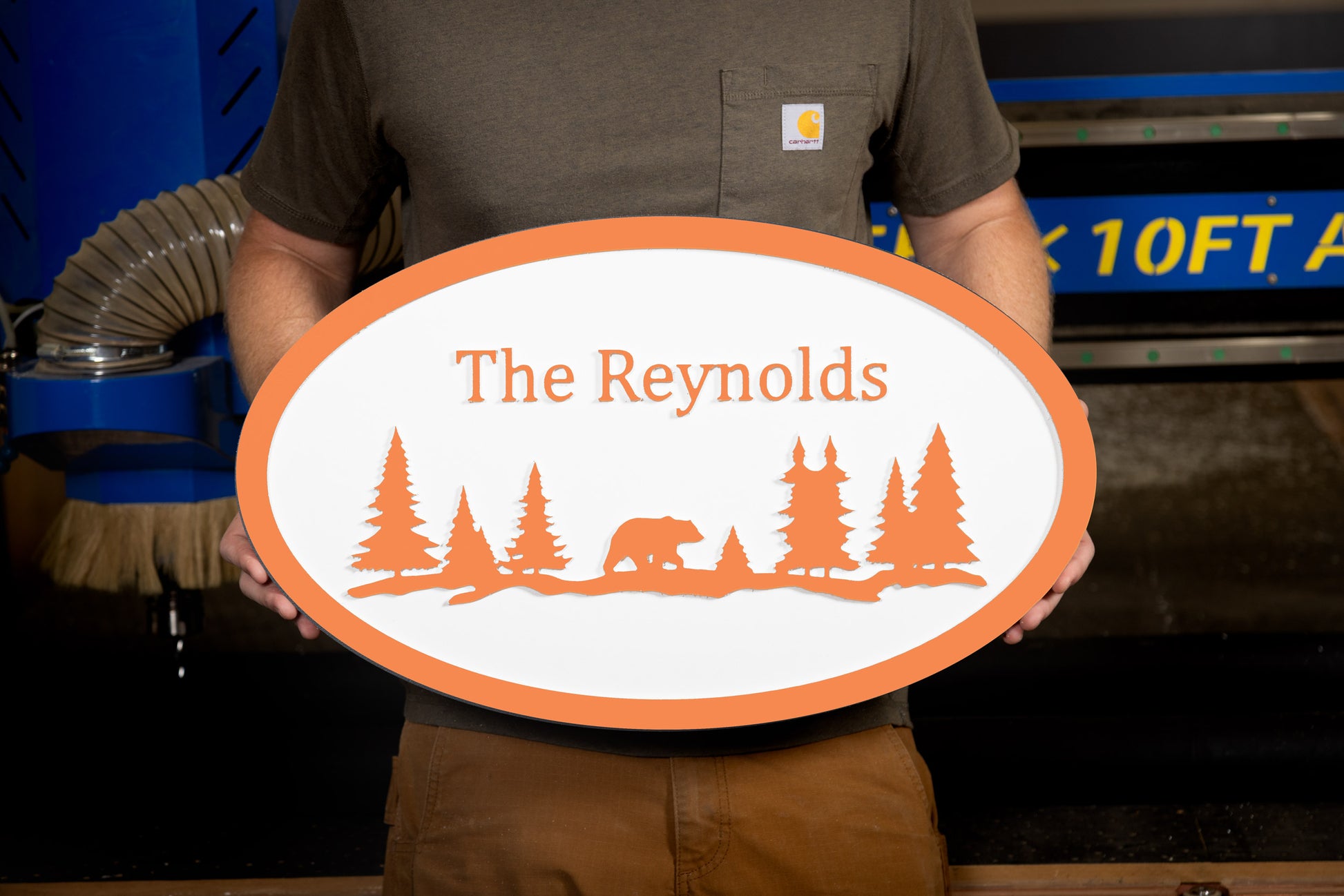 orange oval large house sign mountain trees bear custom